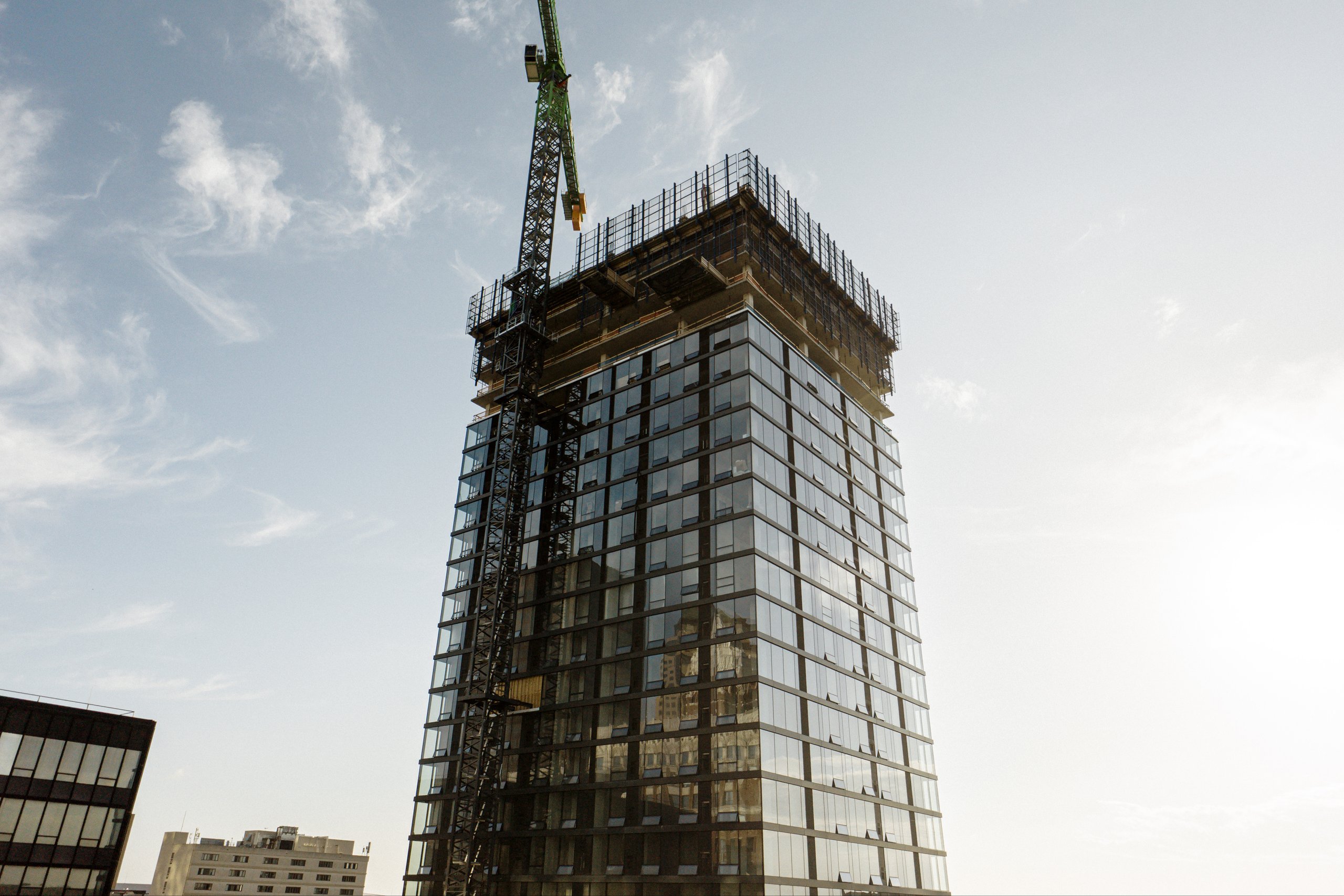 515 Walnut Tower under construction with tower crane, The WILL Group